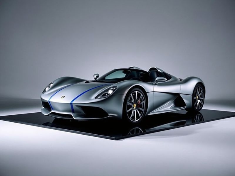 A sleek Grace Series 6 home fitness machine in a modern living room, with a user performing a workout on the touchscreen disp